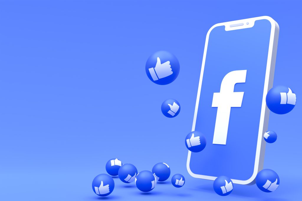 Facebook symbol on screen smartphone or mobile 3d render and fac Facebook symbol on screen smartphone or mobile 3d render and facebook reactions love,wow,like emoji 3d render