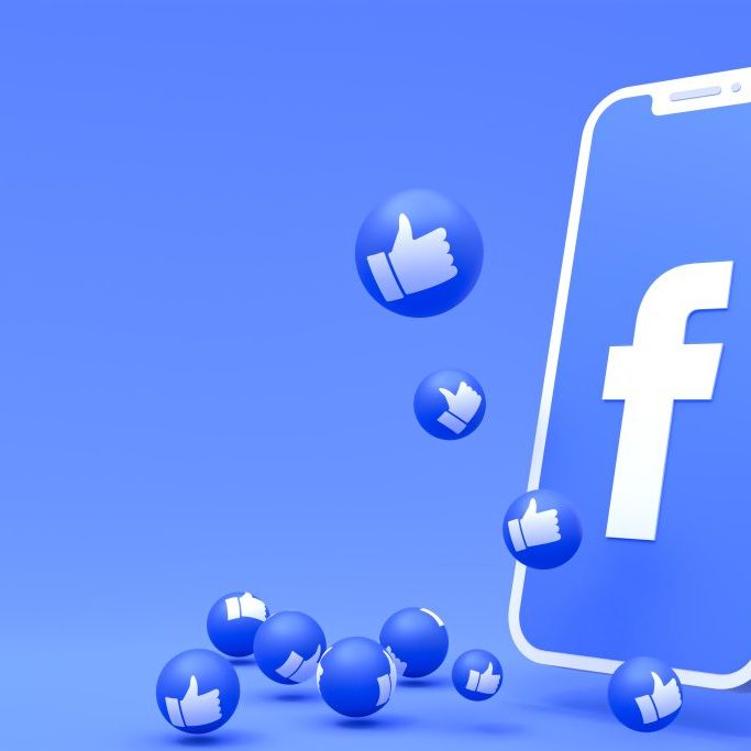 Facebook symbol on screen smartphone or mobile 3d render and facebook reactions love,wow,like emoji 3d render