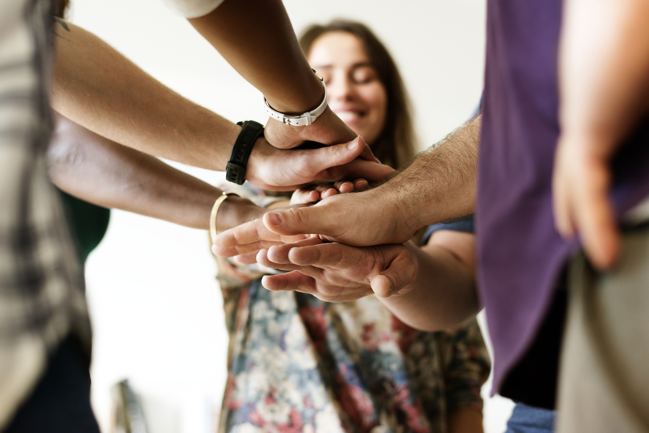 Group of diverse people joined hands together teamwork Group of diverse people joined hands together teamwork