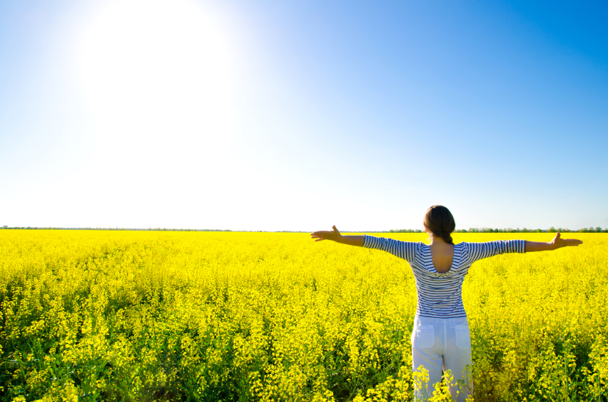 woman in the field woman standing in the field
