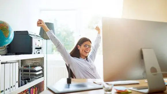 woman at desk small business large